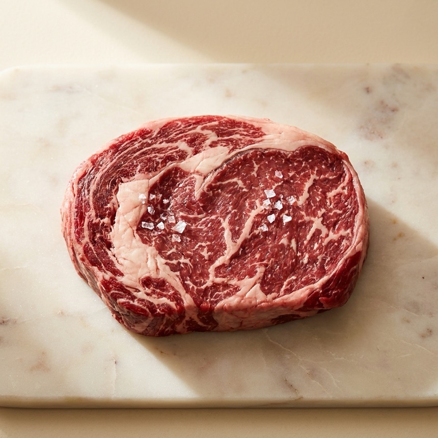 A well-marbled Wagyu-Angus ribeye.